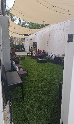 The Canopy 18 outdoor patio seating under shade sails